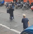Imagens de câmera de segurança mostram ação na região da 25 de março  Foto: Reprodução/Band