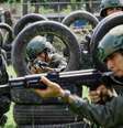 Soldados participam de um exercício liderado pelas Forças Armadas Nacionais Bolivarianas para treinar civis no manuseio de armas, após o presidente da Venezuela, Nicolás Maduro, mobilizar o Exército em comunidades de todo o país, em meio ao aumento das tensões com os Estados Unidos (imagem ilustrativa).  Foto: REUTERS - Juan Carlos Hernandez / RFI