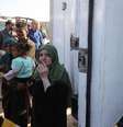 Corpos de palestinos mortos são transferidos por caminhões refrigerados da Cruz Vermelha  Foto: AFP / BBC News Brasil