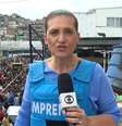 A repórter Bette Lucchese em matéria no 'JN' sobre a megaoperação com dezenas de mortes, inclusive de policiais, em comunidades do Rio  Foto: Reprodução/TV