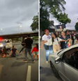 Familiares de mortos em massacre no Rio se ajoelham em avenida para pedir liberação de corpos  Foto: Éros Mendes / Terra