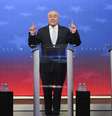 Debate entre os três candidatos a prefeito de Nova York - o ex-governador Andrew Cuomo, o republicano Curtis Sliwa e o socialista democrata Zohran Mamdani -, em 16 de outubro de 2025.  Foto: AFP - ANGELINA KATSANIS / RFI