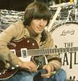 George Harrison com os Beatles em 1965  Foto: David Redfern / Redferns via Getty / Rolling Stone Brasil