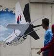 Mural sobre o voo MH370 em Kuala Lumpur, na Malásia  Foto: ANSA / Ansa - Brasil