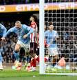 Jogadores do Manchester City comemorando gol  Foto: ( Getty Images) / Sportbuzz