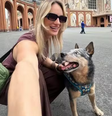 A engenheira Mariani em última foto com o cachorro Chopp  Foto: Reprodução/TV Gazeta