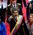 Maduro entre Delcy Rodriguez e sua esposa Cilia Flores, em sua posse de 2018  Foto: Reuters / BBC News Brasil