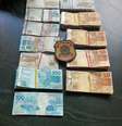 Mais de R$ 97 mil foram apreendidos durante a operação.  Foto: Divulgação/Policia Federal / Estadão