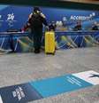 Passageiro em desembarque no Aeroporto de Milão-Malpensa  Foto: ANSA / Ansa - Brasil