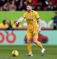 Chuteira personalizada para recorde de James Milner –  Foto: Paul Harding/Getty Images / Jogada10