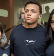  Vitor Hugo Simonin chega à delegacia com camiseta com dizeres: 'Não Se Arrependa de Nada'  Foto: Reprodução