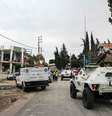 Veículos da Unifil passam perto de hospital destruído por ataque israelense no sul do Líbano  Foto: ANSA / Ansa - Brasil