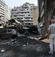 Pessoas inspecionam bairro de Beirute após ataque israelense em 8 de abril  Foto: ANSA / Ansa - Brasil