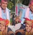 Jovem indiana comemora aprovação em processo seletivo da polícia carregando o pai no colo  Foto: Reprodução/Youtube News Anek