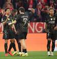  Foto: Alex Grimm/Getty Images - Legenda: Jogadores do PSG comemoram o gol marcado por Dembélé / Jogada10
