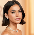 A maquiagem para olhos castanhos ganha destaque com tons cobre, dourado, azul e roxo, que ajudam a iluminar a íris e criar contraste sofisticado.  Foto: Getty Images / Purepeople