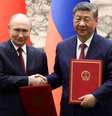 Putin e Xi Jinping assinaram mais de 20 acordos comerciais e tecnológicos, além de uma declaração sobre uma "ordem mundial multipolar"  Foto: Reuters / BBC News Brasil