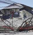 Prédios em General Santos ficaram destruídos  Foto: EPA / BBC News Brasil