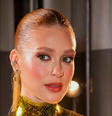 Sinto muito, Converse, mas encontrei na Renner um tênis feminino na cor 'dourado Cleópatra' para iluminar o look no inverno. Foto: Brazilnews, Manuela Scarpa / Purepeople