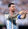 Lionel Messi comemora terceiro gol feito contra a Argélia em partida da primeira rodada do grupo J da Copa do Mundo   Foto: Michael Steele/Getty Images / Esporte News Mundo