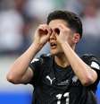 Elijah Just comemora primeiro gol feito contra o Irã -   Foto: Harry How/Getty Images / Esporte News Mundo