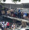 Venezuelanos saqueiam loja atingida por terremoto em Catia La Mar  Foto: ANSA / Ansa - Brasil