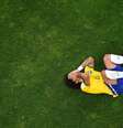 O então lateral-esquerdo do Brasil, Marcelo, reage à derrota para a Alemanha no Estádio do Mineirão, em 8 de julho de 2014, em Belo Horizonte (MG)  Foto: Francois Xavier Marit - Pool/Getty Images / BBC News Brasil
