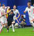 Messi contra a Inglaterra  Foto:  Evrim Aydin/Anadolu via Getty Images
