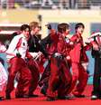 BTS em ação no show  Foto: Carl Recine / Getty Images
