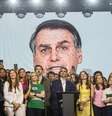 Vídeo do ex-presidente Jair Bolsonaro feito por inteligência artificial foi apresentado na convenção do PL  Foto: TABA BENEDICTO/ESTADÃO CONTEÚDO