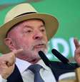 Lula durante cerimônia de sanção da lei que cria linha de crédito para empresas afetadas pelas tarifas dos EUA, no Palácio do Planalto, em julho deste ano  Foto: REUTERS/Adriano Machado / BBC News Brasil