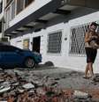 Moradores nas ruas de Cali após terremoto de 10 de agosto de 2026.  Foto: RFI