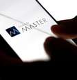 Tela de celular mostra logo do Banco Master  Foto: Getty Images / BBC News Brasil