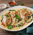 Filé de frango cremoso com espinafre e tomate Foto: vkuslandia | Shutterstock / Portal EdiCase
