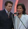 Em 1997, Roberto Carlos foi ao SBT e teve uma conversa reveladora com Silvio Santos  Foto: Reprodução (Imagem com qualidade melhorada por IA)
