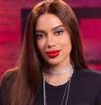 Anitta se destacou como conselheira dos cantores e não poupou nem a Globo de críticas  Foto: Divulgação/TV Globo