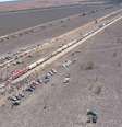 Imagem aberta dá a dimensão dos mais de 1.400 metros de comprimento do conjunto formado pelas 113 carretas com total de 117 eixos. Foto: Reprodução: Transporte Mundial / Estadão
