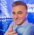 Luciano Huck segue normalmente no 'Domingão', sem ser afetado na Globo pelo vazamento de suas mensagens com Daniel Vorcaro  Foto: Reprodução