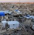 Palestinos montam barracas para viverem em meio aos escombros de prédios residenciais destruídos ao longo dos anos de ofensiva israelense, na cidade de Gaza. Foto de 22 de setembro de 2026.  Foto: RFI