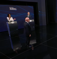 Flávio Bolsonaro (PL) e Lula (PT) se enfrentam no debate da Band neste domingo, 18  Foto: Reprodução/Band TV