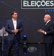Flávio Bolsonaro e Lula no primeiro debate na Band  Foto: Reprodução/Band