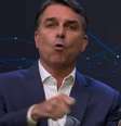 Flávio mostra a palavra 'corrupto' na mão  Foto: Reprodução/YouTube/Band 
