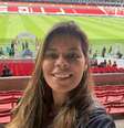 Narradora brasileira Elaine Trevisan, 38 anos, acompanha atenta os jogos da semifinal da Libertadores Feminina de 2026   Foto: Arquivo Pessoal 