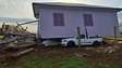 Tornado faz casa parar em cima de carro no interior de SC
