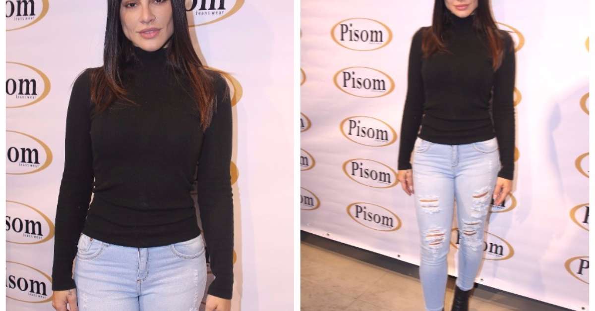 calça clara com bota preta