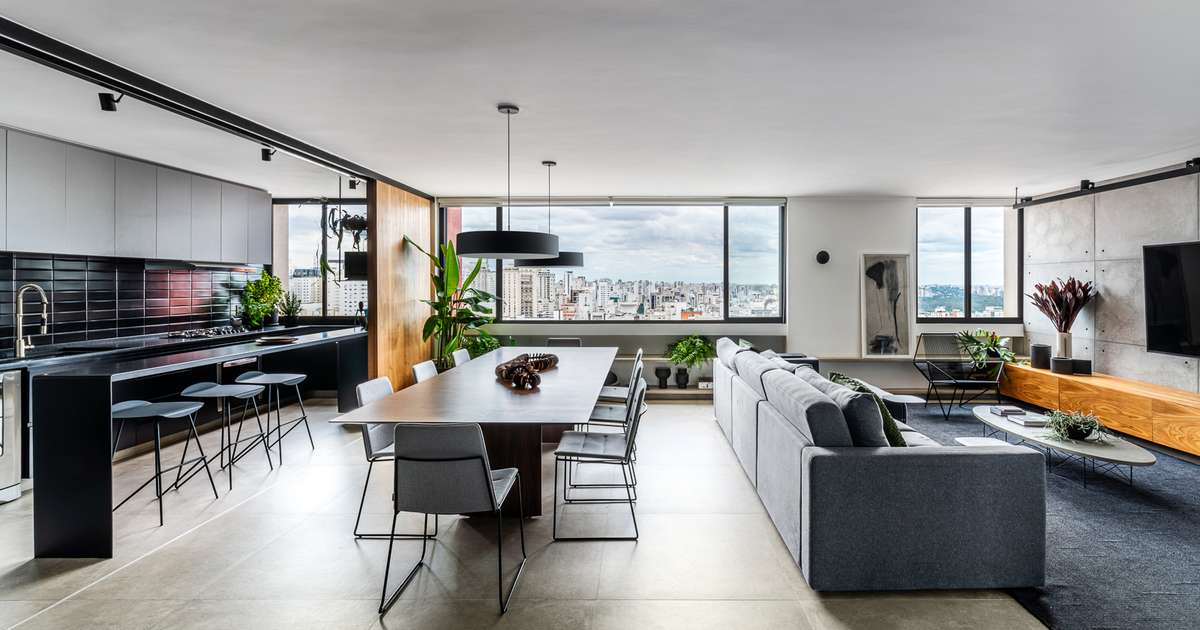 Minimalista: apê de 110m² aposta em integração, madeira e cimento queimado