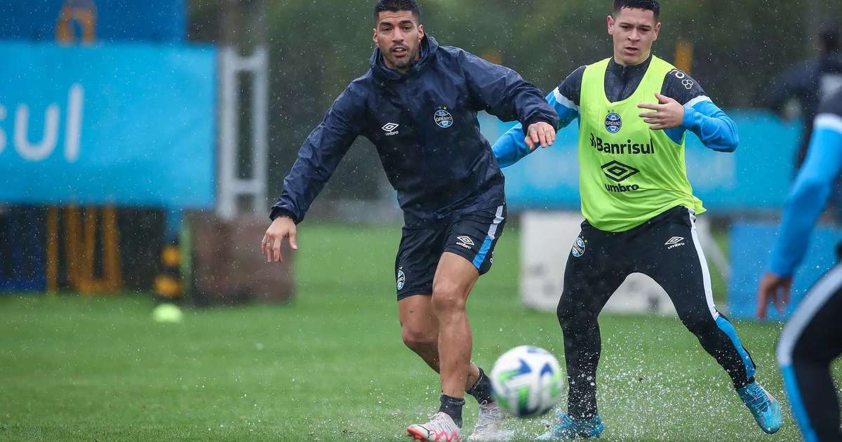 Sob muita chuva, Grêmio encerra preparação para duelo contra o Bahia