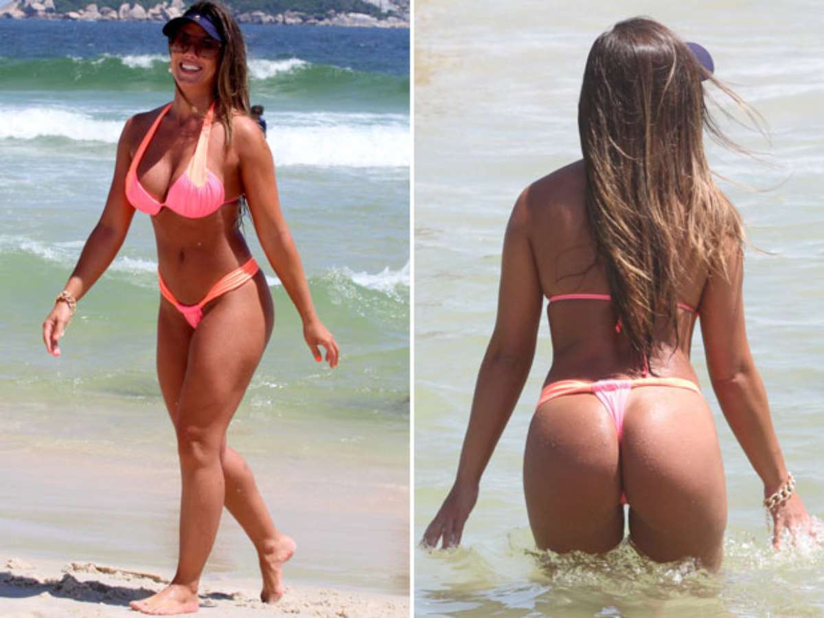 Nicole Bahls curte praia com amigos e exibe boa forma