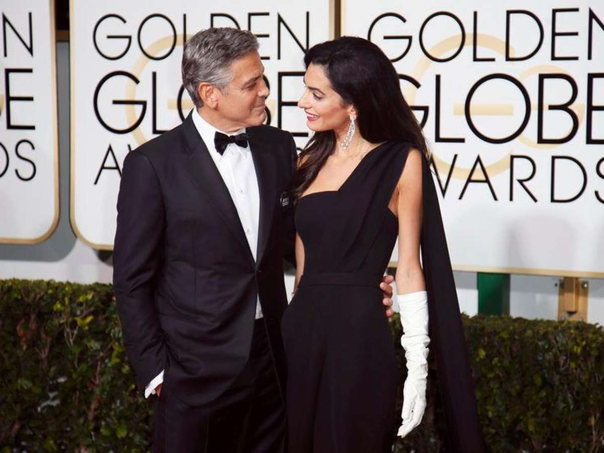 Amal Clooney se destaca entre as estrelas no tapete vermelho do