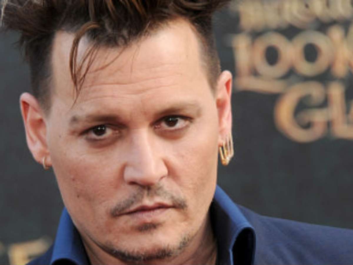 Johnny Depp x Amber Heard: fã do ator diz já ter gasto US$ 30 mil